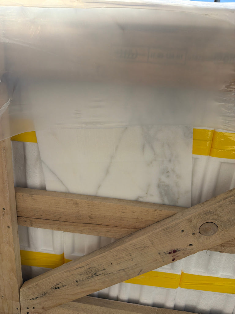 Calacatta Gold Marble 12x12 Polished slab with gray veining, plastic-wrapped