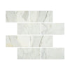 Marble-patterned rectangular tiles from Calacatta Gold Marble 12X24 collection