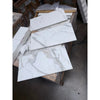 Calacatta Gold Marble 12x24 polished tiles stacked on pallet