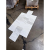 White marble-look tiles with gray veining from Calacatta Gold Marble 12x24 collection