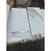 White marble-look tiles with grey veining from Calacatta Gold Marble 12X24 collection