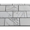 White marble-patterned rectangular tiles from Calacatta Gold Marble 12X24 collection