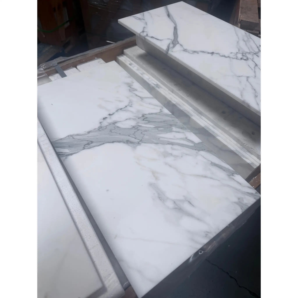 Calacatta gold marble 12x24 polished slab with white marble and elegant gray veining for premium surfaces