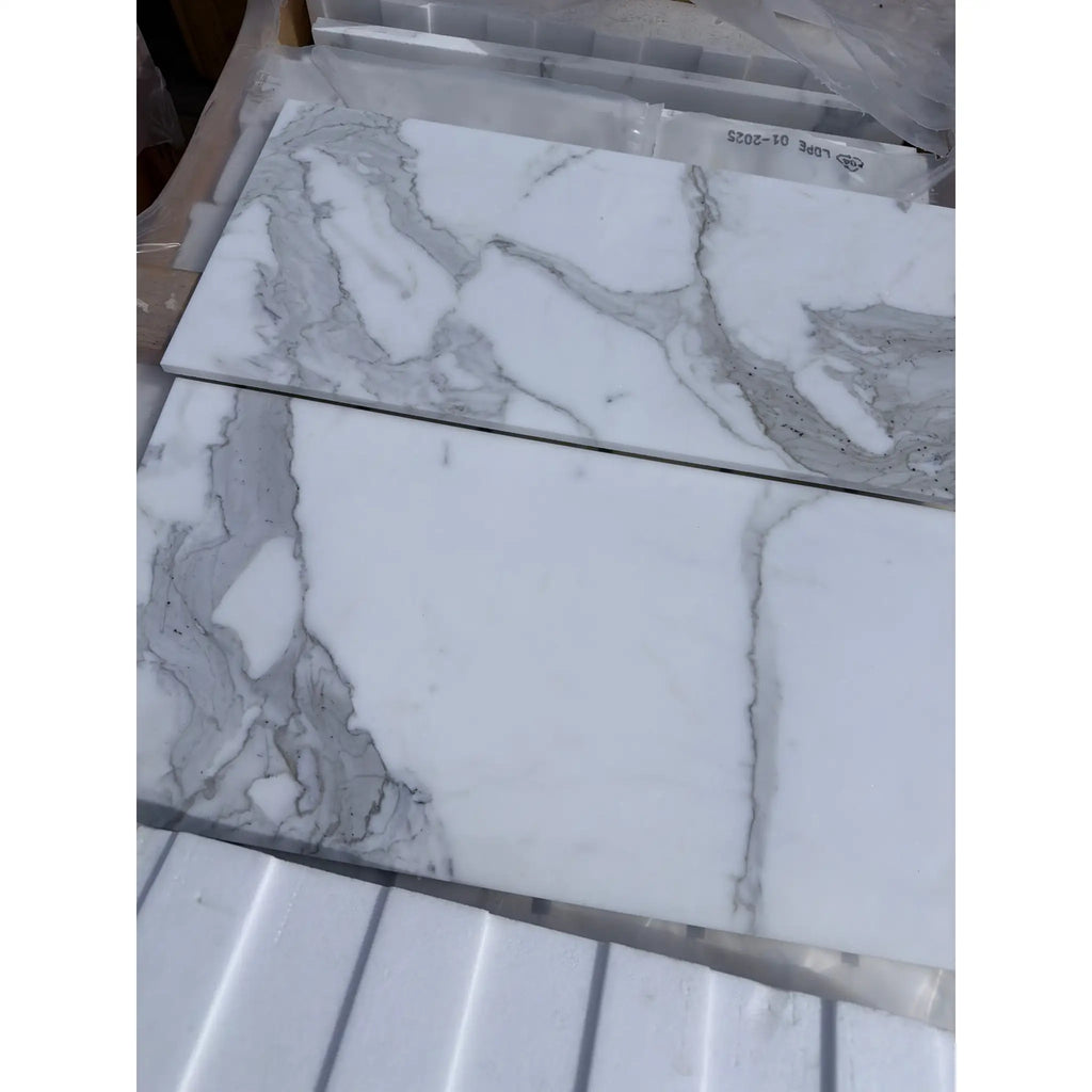 Calacatta Gold 12x24 polished white marble tile with gray veining