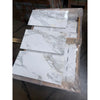 Calacatta Gold Marble 12x24 polished tiles with white marble and gray veining on pallet