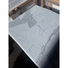 Two large Calacatta Gold Marble tiles with prominent grey veining in polished or honed finish