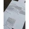 White and gray marble-look floor tiles from Calacatta Gold Marble 12X24 collection