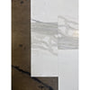 White and gray marble-patterned tile samples for Calacatta Gold Marble 12X24