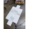 White marble-look tiles with gray veining from Calacatta Gold Marble 12X24 collection