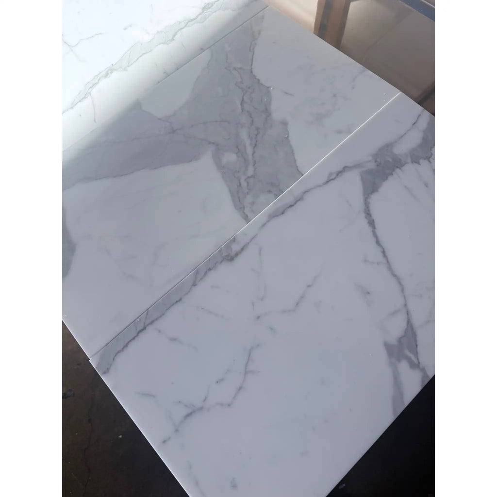 White marble-look tiles with gray veining from Calacatta Gold Marble 12x24 polished or honed