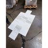 White marble-look tiles with gray veining from Calacatta Gold Marble 12x24 collection