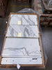 White marble-look tiles with grey veining and golden accents in Calacatta Gold Marble 12X24