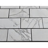 White marble-patterned rectangular tiles from Calacatta Gold Marble 12X24 collection