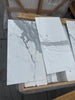 Calacatta Gold Marble 12x24 slabs with white background and elegant gray veining
