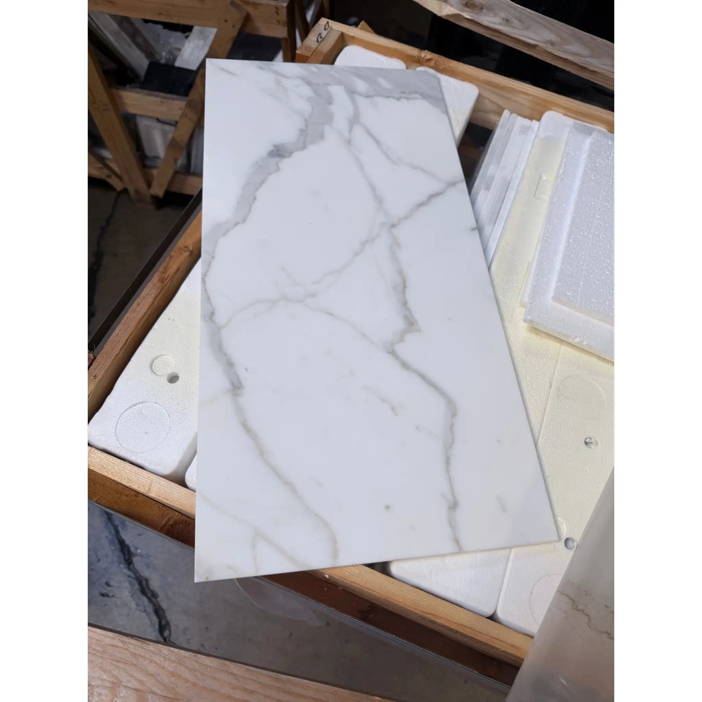 Calacatta Gold Marble 12x24 Polished Ceramic Tile with Gray Veining