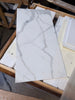 Calacatta Gold Marble 12x24 Polished Ceramic Tile with Gray Veining