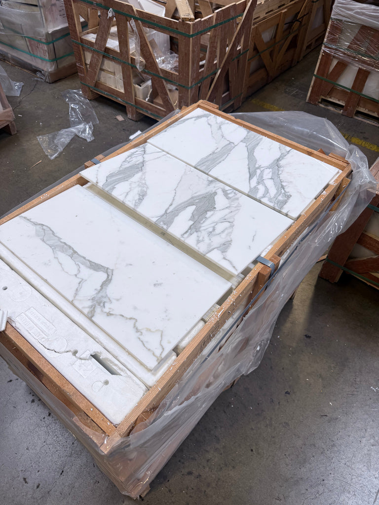 White Calacatta Gold Marble tiles with gray veining in a wooden crate for 12x24 polished or honed finish
