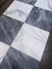 Calacatta Gold Marble 18x18 polished square tiles in white and dark gray patterns