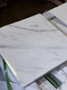 Calacatta Gold Marble 18x18 polished tile with white base and subtle gray veining