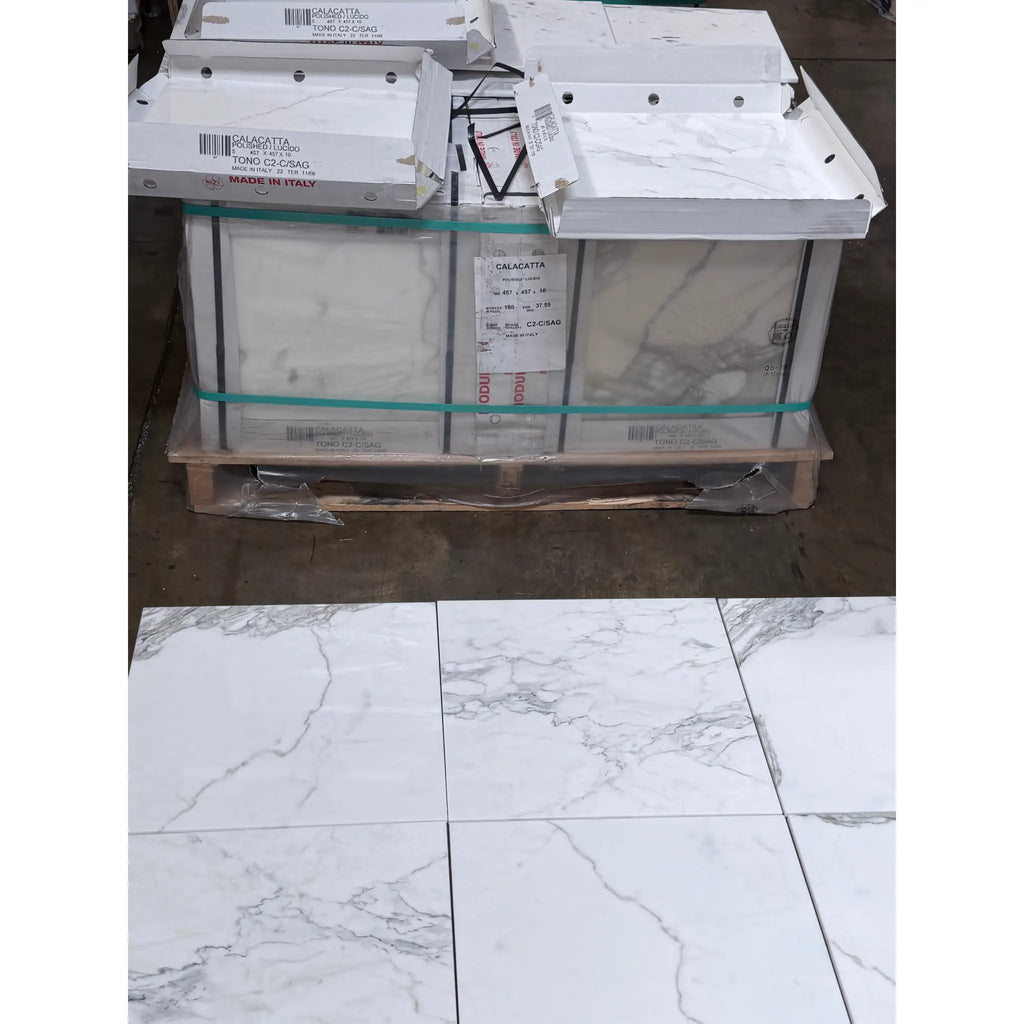 Calacatta Gold Marble 18x18 Polished white tiles with gray veining in boxes on pallet