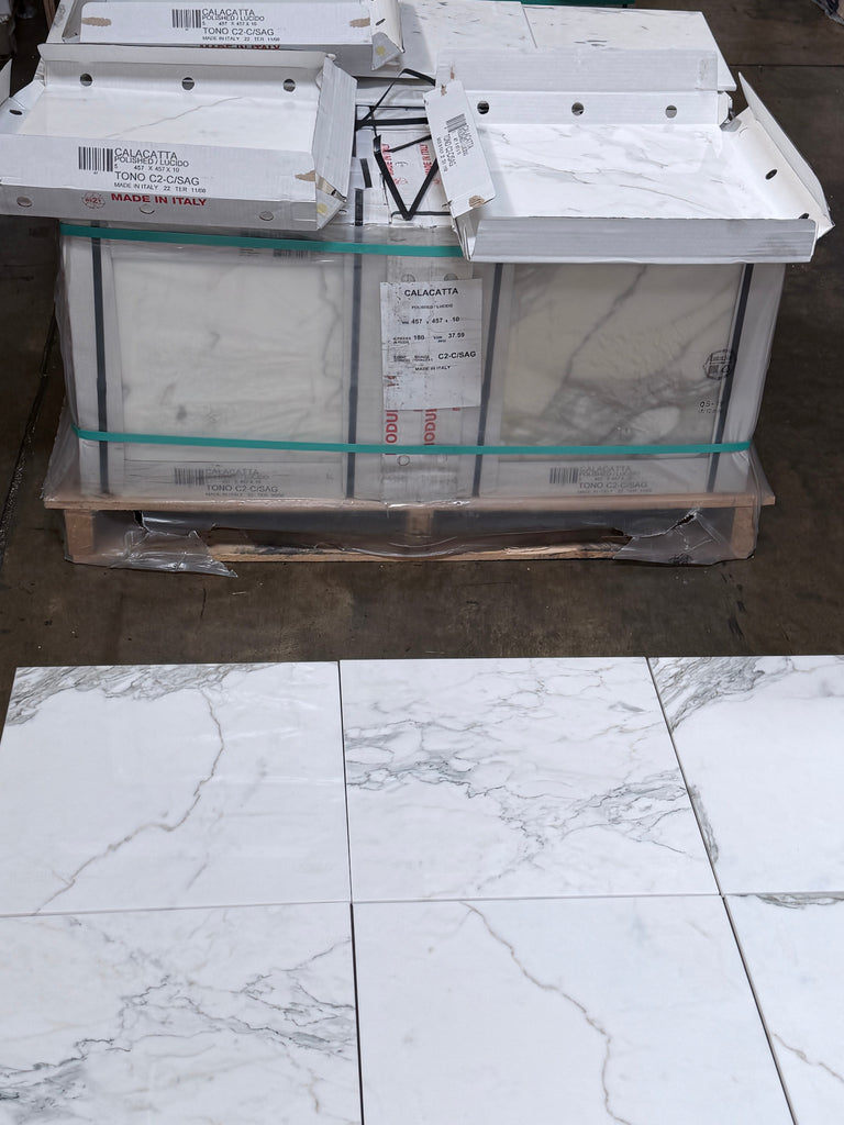 Calacatta Gold Marble 18x18 Polished white tiles with gray veining in boxes on pallet
