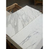 Calacatta Gold Marble 18X36 polished or honed with two white slabs featuring gray veining