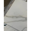 White marble tile with gray veining from Calacatta Gold Marble 18x36 collection