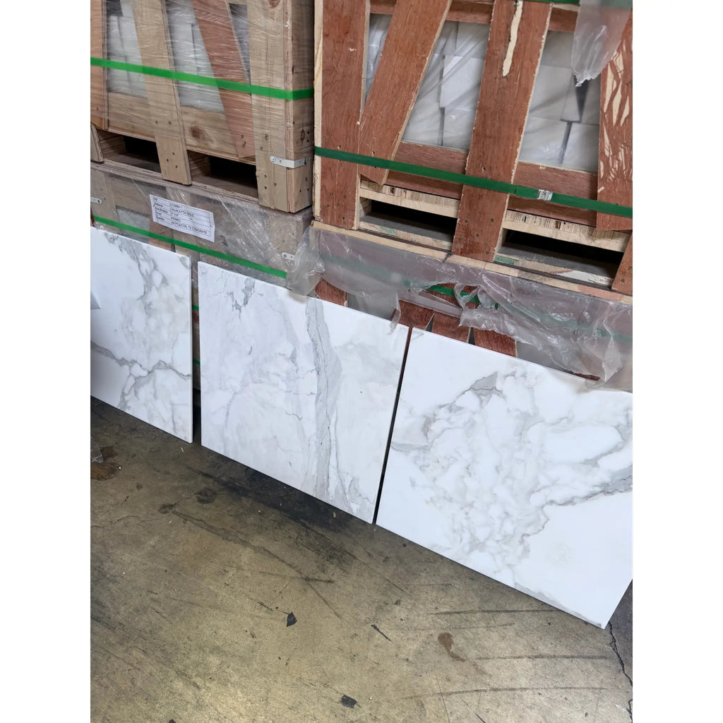 Marble-patterned Calacatta Gold Marble 24X24 floor tiles in polished or honed finish