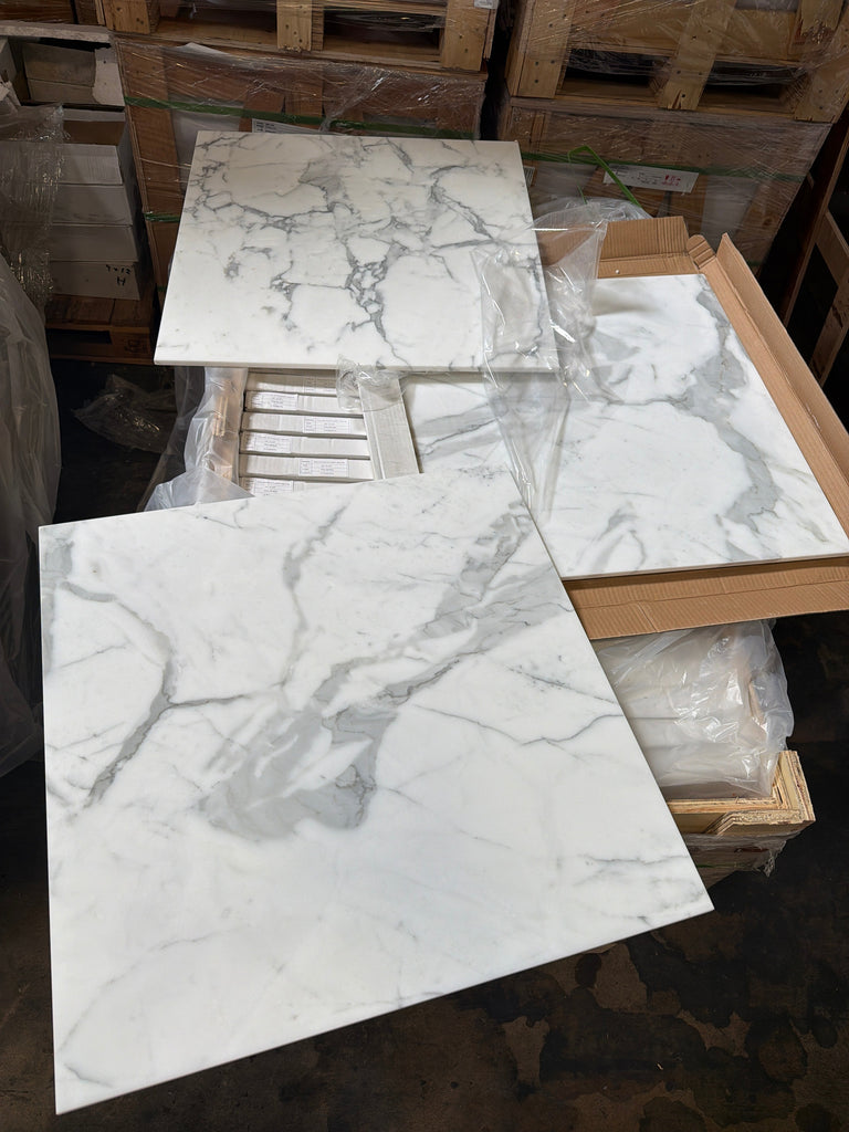 Calacatta Gold Marble 24x24 Polished Ceramic Tile with Gray Veining