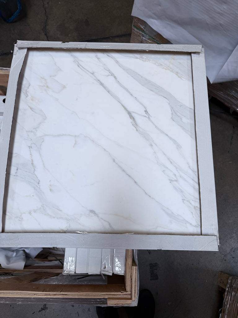 Calacatta Gold Marble 24x24 Polished Rectangular Tile with Gray Veins