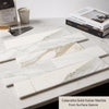 Calacatta gold marble 2x8 polished tiles with elegant white and gold veining in a sleek linear pattern