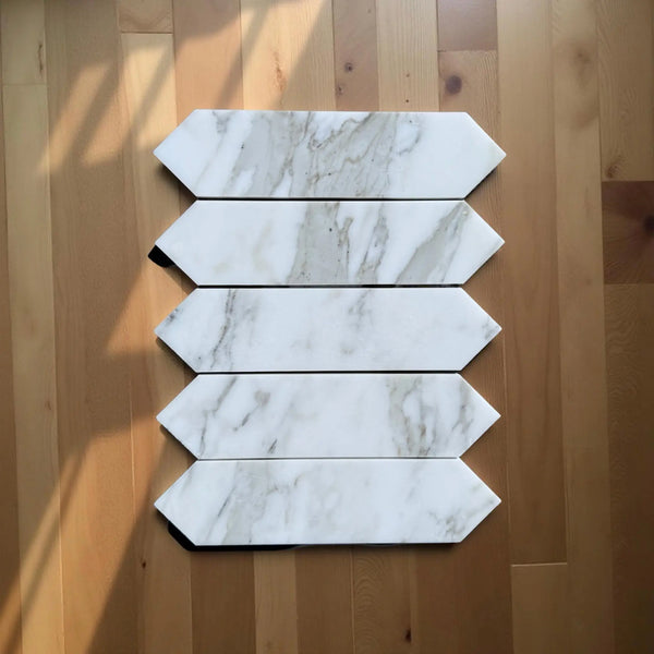 Calacatta Gold Marble 3X12 Picket Mosaic featuring elegant arrow-shaped tiles