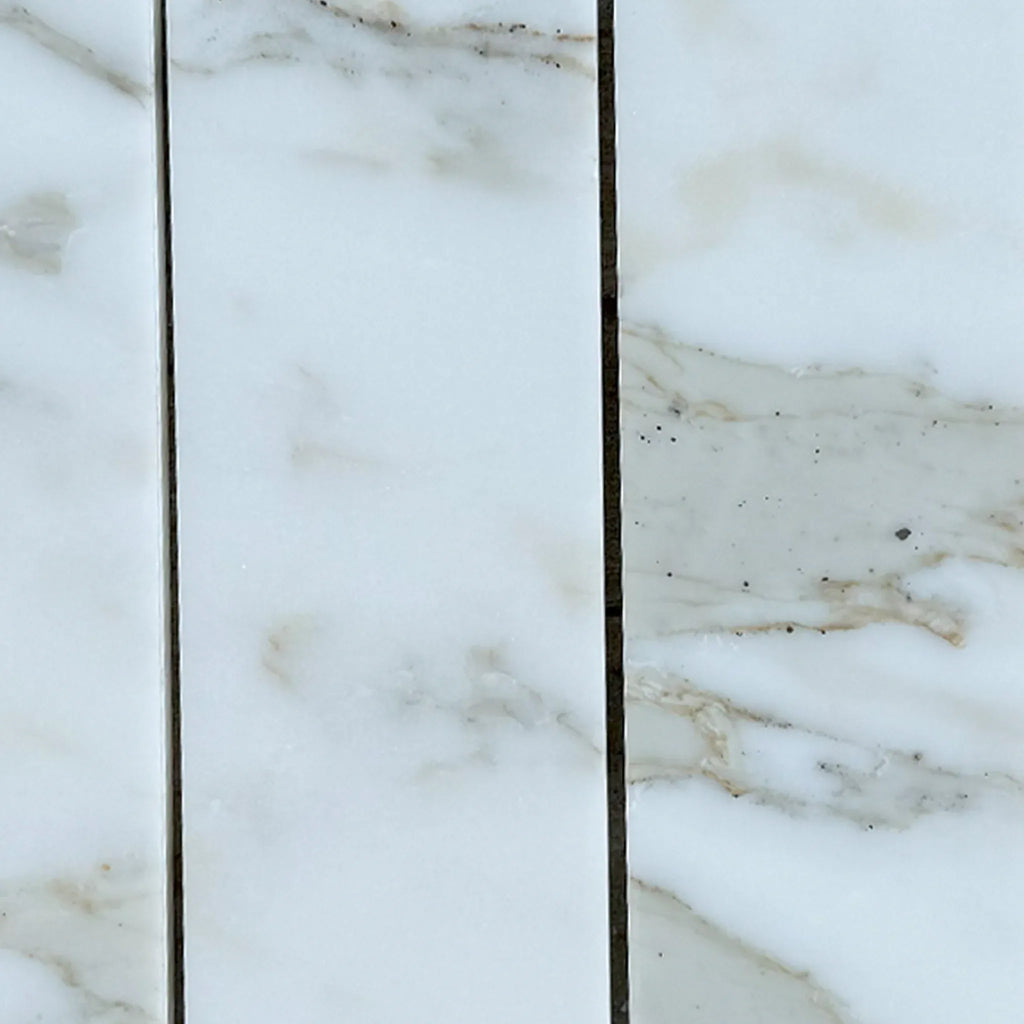 Calacatta Gold Marble 3X12 Picket Mosaic featuring elegant marble-patterned tiles