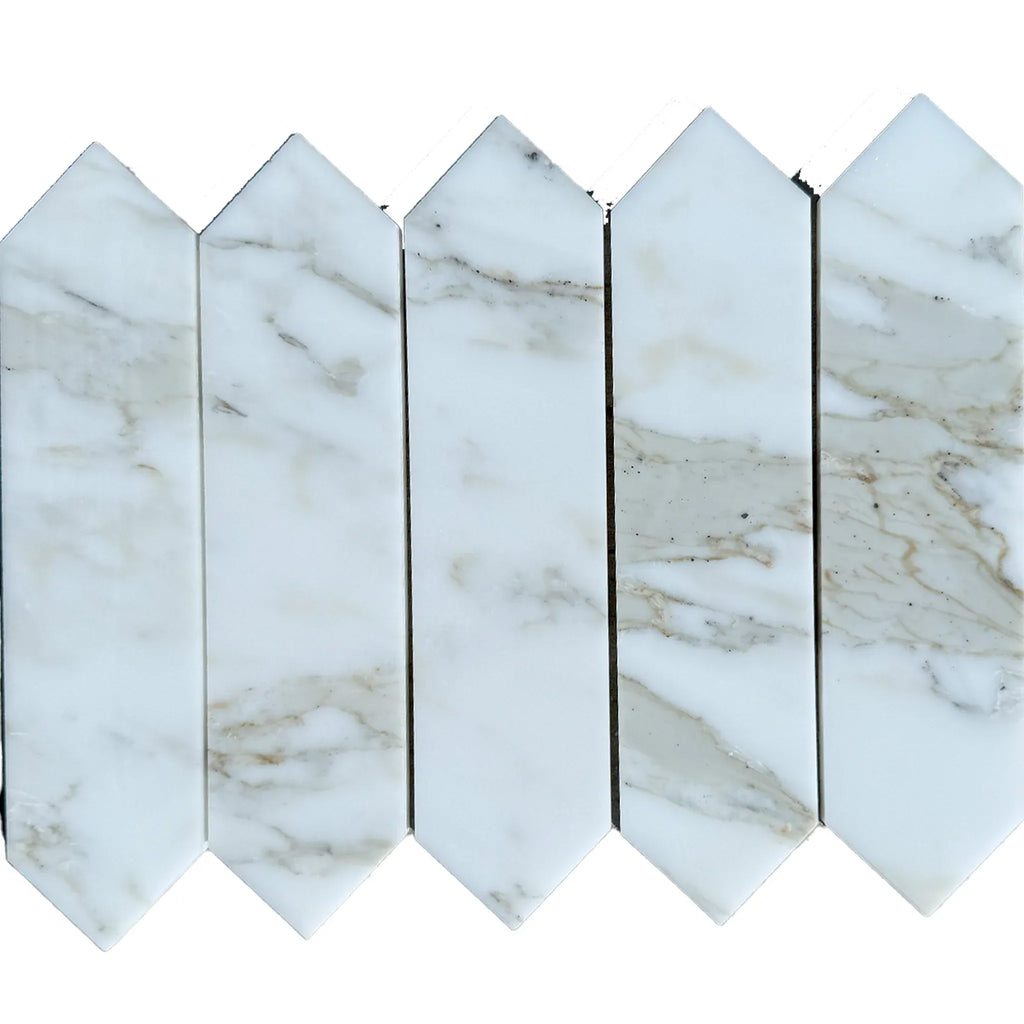White marble picket tile in Calacatta Gold Marble 3’’ X 12’’ Picket Mosaic design