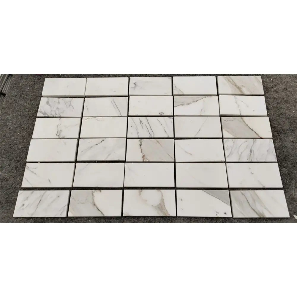 Calacatta Gold 3x6 polished white marble mosaic tiles with gray veining