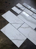 Calacatta Gold marble 6x12 polished tiles with white marble effect and gray veining