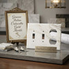 Calacatta gold marble double toggle duplex switch wall plate in white marble with gold veining and 18-2 outlet configuration