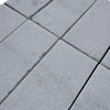 Gray concrete pavers featuring Calacatta Gold Marble in a sand blasted finish