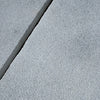 Rough gray stone slabs of Calacatta Gold Marble in a sand blasted finish