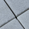 Textured white stone tiles in Calacatta Gold Marble with a sand blasted finish