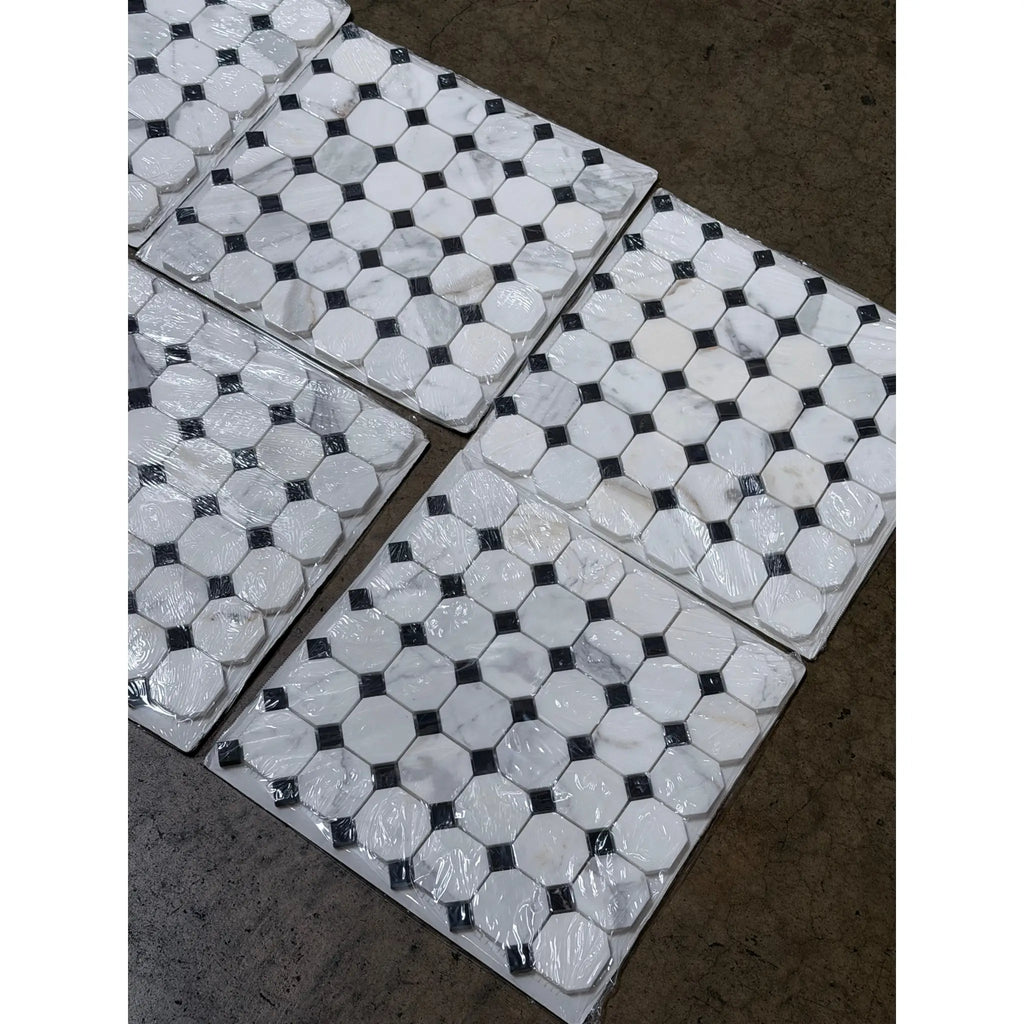 Calacatta gold octagon mosaic marble tile polished with white hexagonal tiles and black accent squares in clear packaging