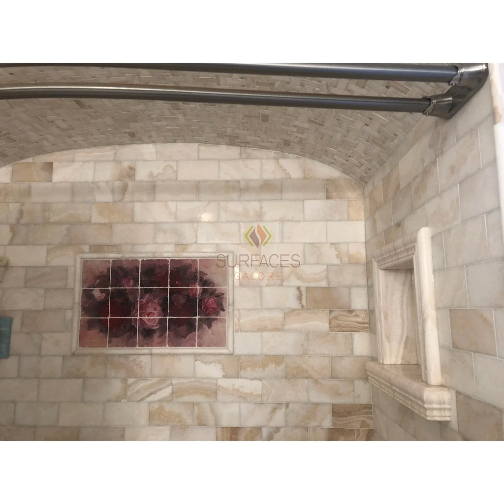 Tiled shower featuring arched ceiling with Calacatta Gold Octagon Mosaic Marble Tile