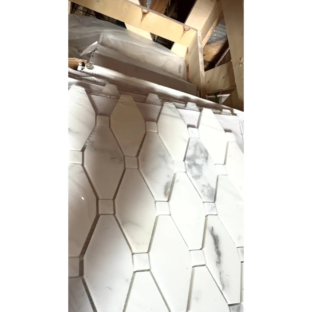 White marble Calacatta Gold octave long octagon mosaic tile with subtle gray veining in polished or honed finish