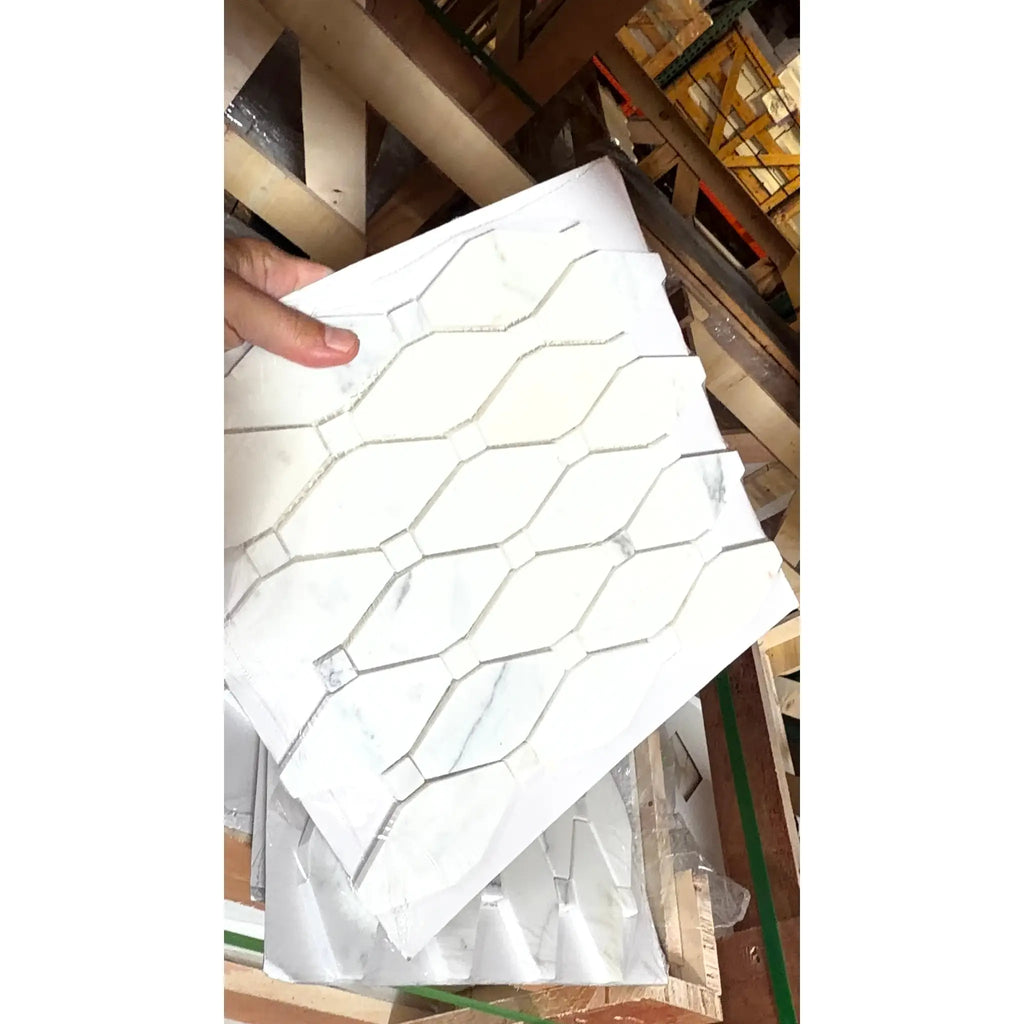 White marble mosaic tile with honeycomb pattern and subtle gray veining calacatta gold octave polished or honed