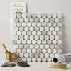 Calacatta gold penny-round mosaic marble tile sheet with white circular tiles and subtle gray veining polished or honed