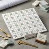 White and light gray calacatta gold pinwheel mosaic marble tile with woven pattern polished or honed finish