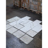 Calacatta Gold mosaic marble tile in polished hexagonal herringbone patterns