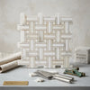 White marble mosaic tile with a woven pattern and subtle veining in calacatta gold triple-weave polished or honed finish