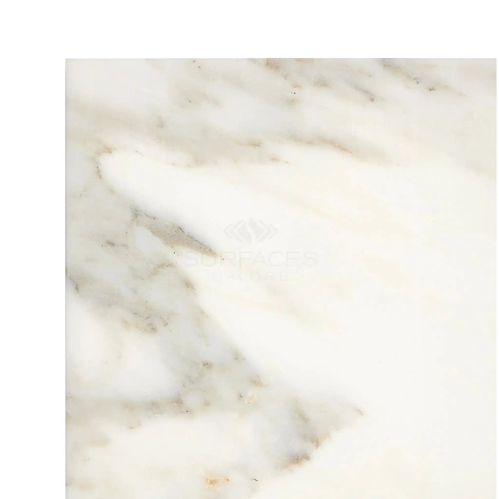 Creamy Calacatta Oliva Marble slab showcasing a polished or honed finish tile