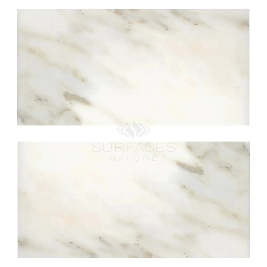 Two Calacatta Oliva Marble 18X36 Polished or Honed Tiles displayed elegantly